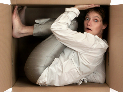 Woman Cramped in Box